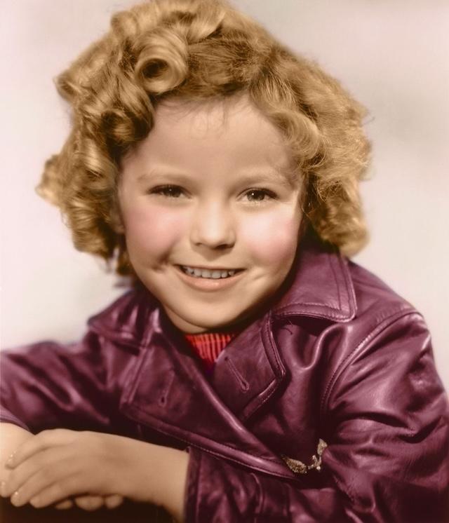 A bright smile and signature curls: Shirley Temple, the beloved child star of the 1930s, continues to enchant generations with her innocent charm and talent